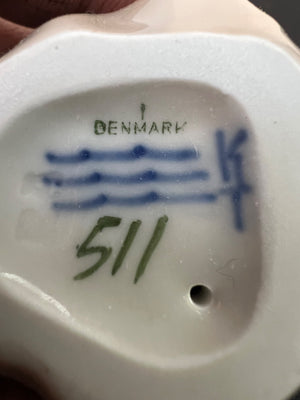 Ceramic product with 'Denmark' and number '511' marking on a white background