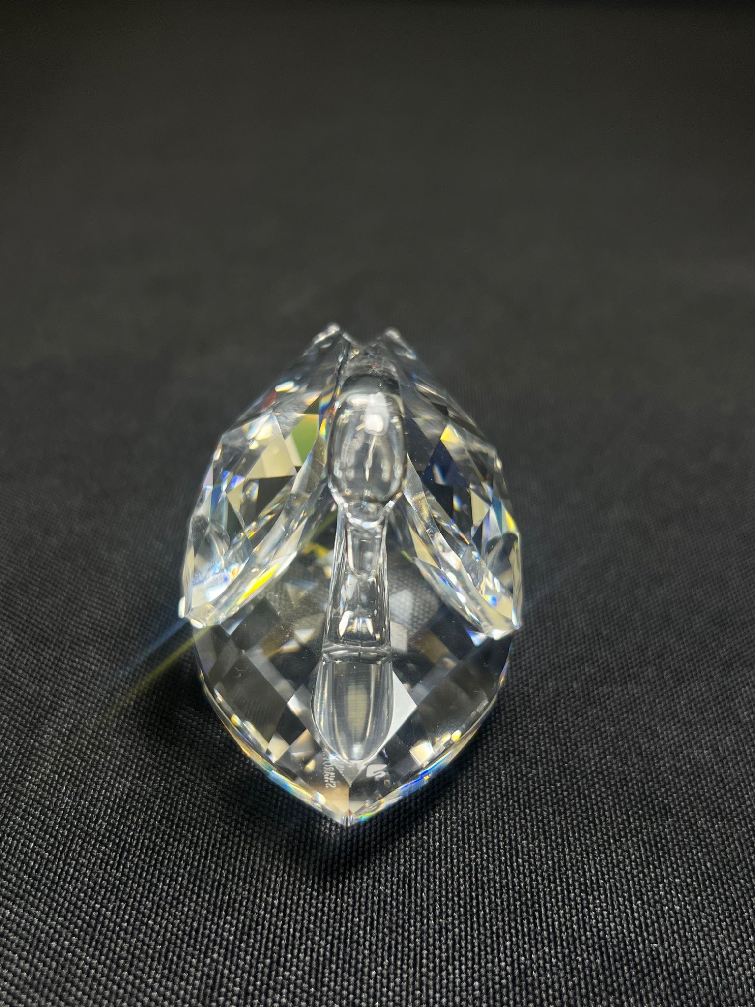 Clear crystal knob on a black background