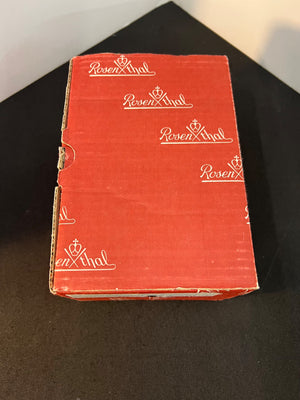 Red box with 'Rosen & Hal' branding on a black surface