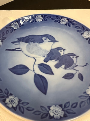 Blue and white ceramic plate with bird design