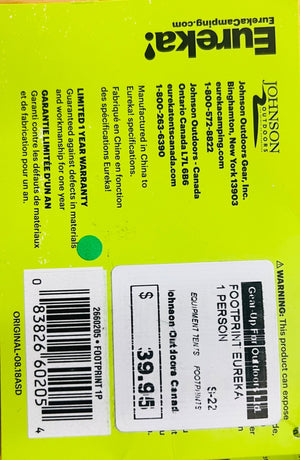 Backpack label with Eureka and Johnson Outdoor Gear branding on a bright yellow background