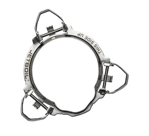 Metallic watch case with 'This Side Up' text on a white background