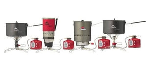 Set of camping stoves with pots on a white background
