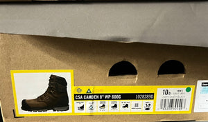 Cardboard box with a label featuring a boot and safety certification details.