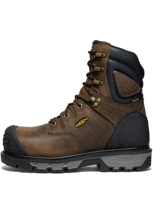 Brown work boot with black accents on a white background