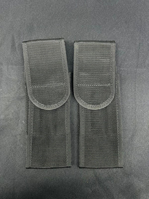 Two gray tactical pouches on a gray background