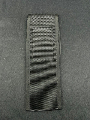 Black tactical pouch on a gray background