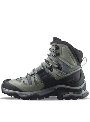 Gray hiking boot with black accents on a white background