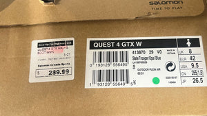 Cardboard box with Quest 4 GTX IV label and barcode on a brown background