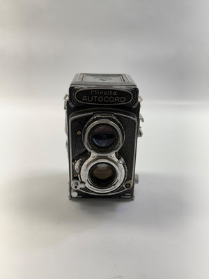 Vintage Minolta Autocord camera on a white background