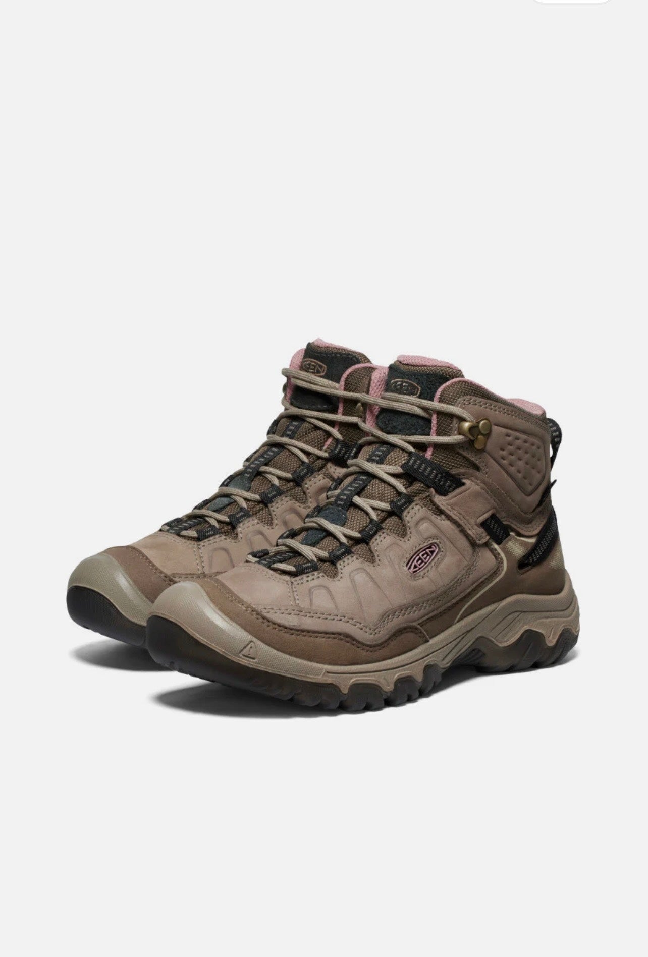 Pair of brown hiking boots on a white background