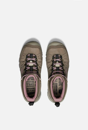 Pair of brown sneakers with pink soles on a white background