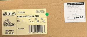 Keen shoe box with product label and price tag on a cardboard background