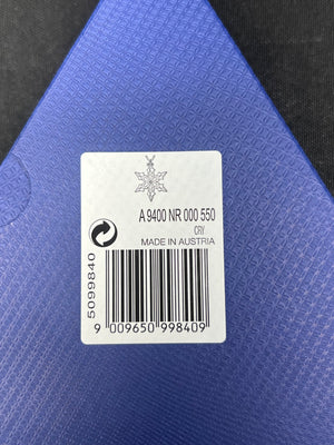 Label with product details on a blue textured surface