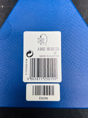Barcodes and a label on a blue surface