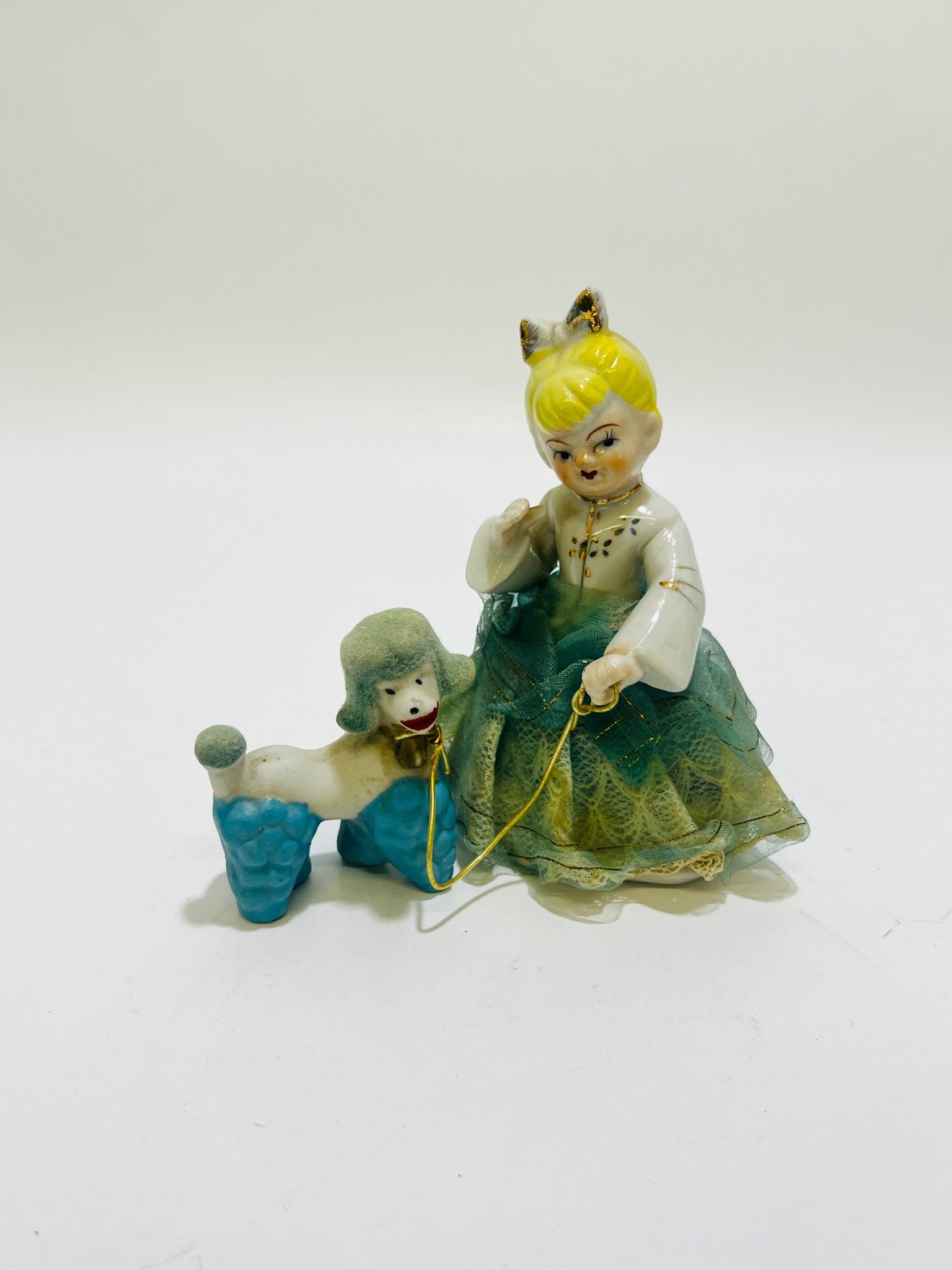 Girl with a poodlePorcelain Figurine