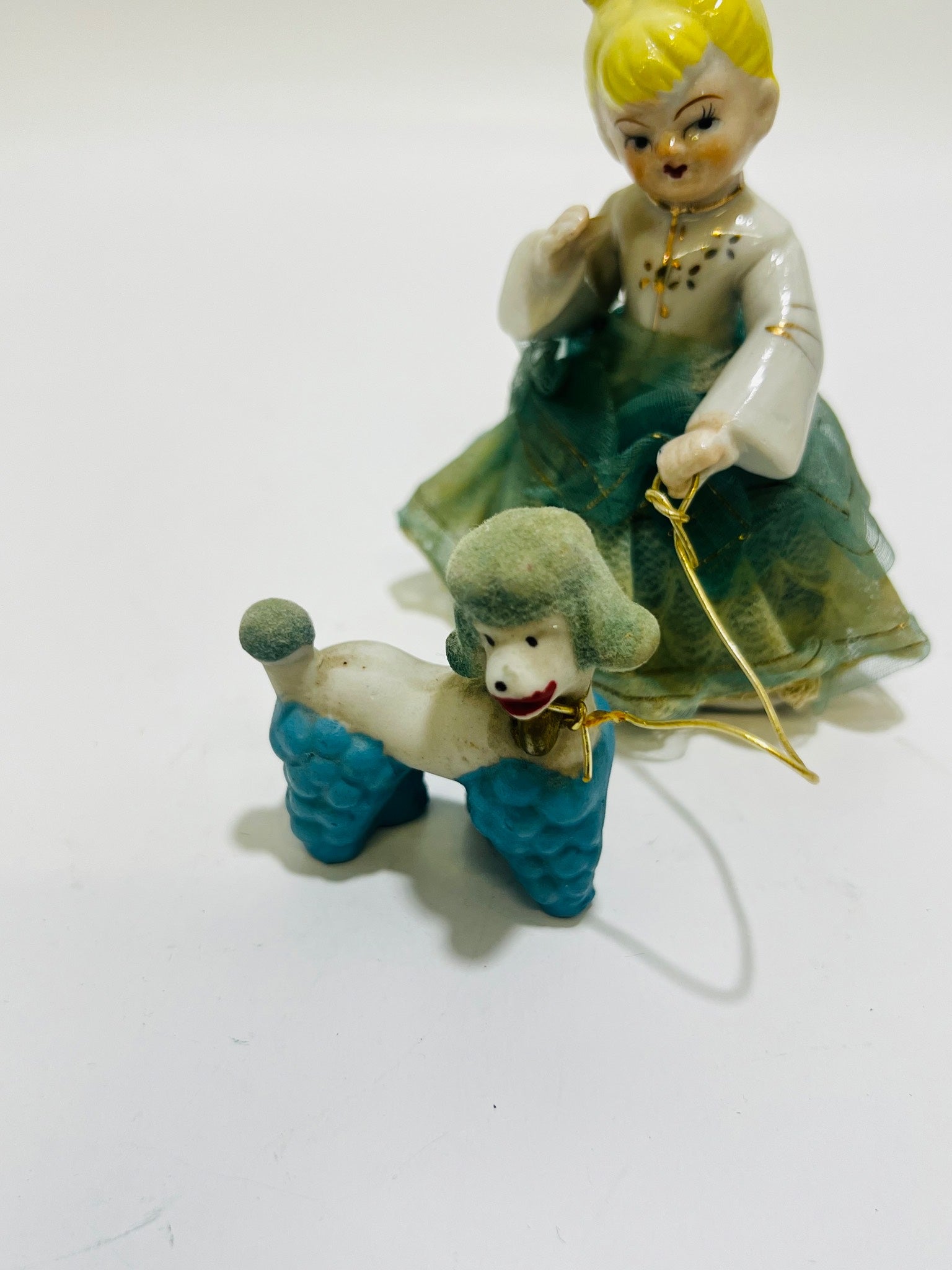 Girl with a poodlePorcelain Figurine