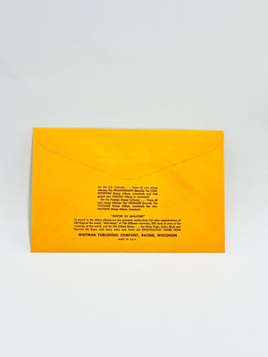 Yellow envelope with black text on a light gray background