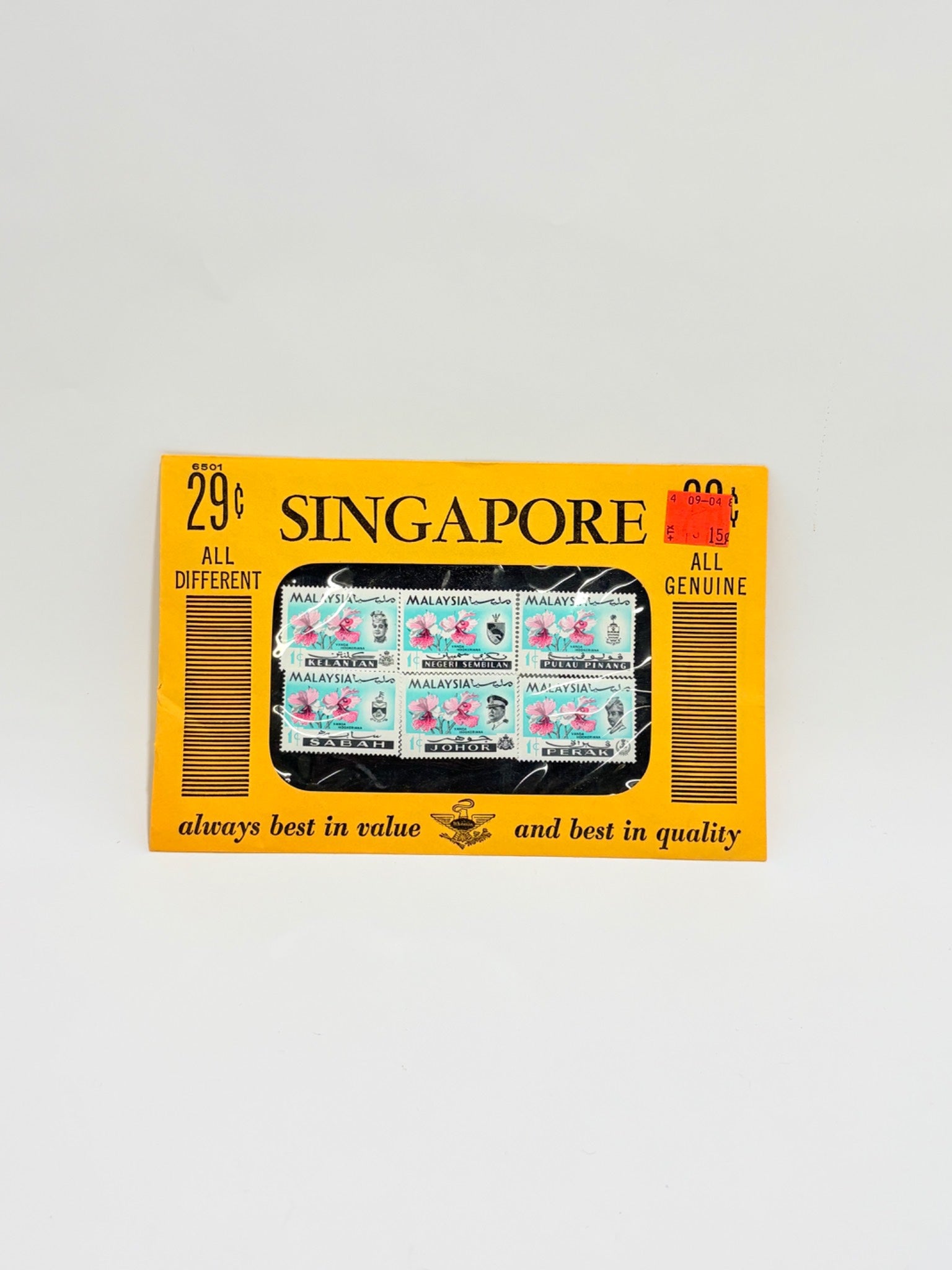 Vintage Singapore postage stamp book with yellow cover and black text on a white background