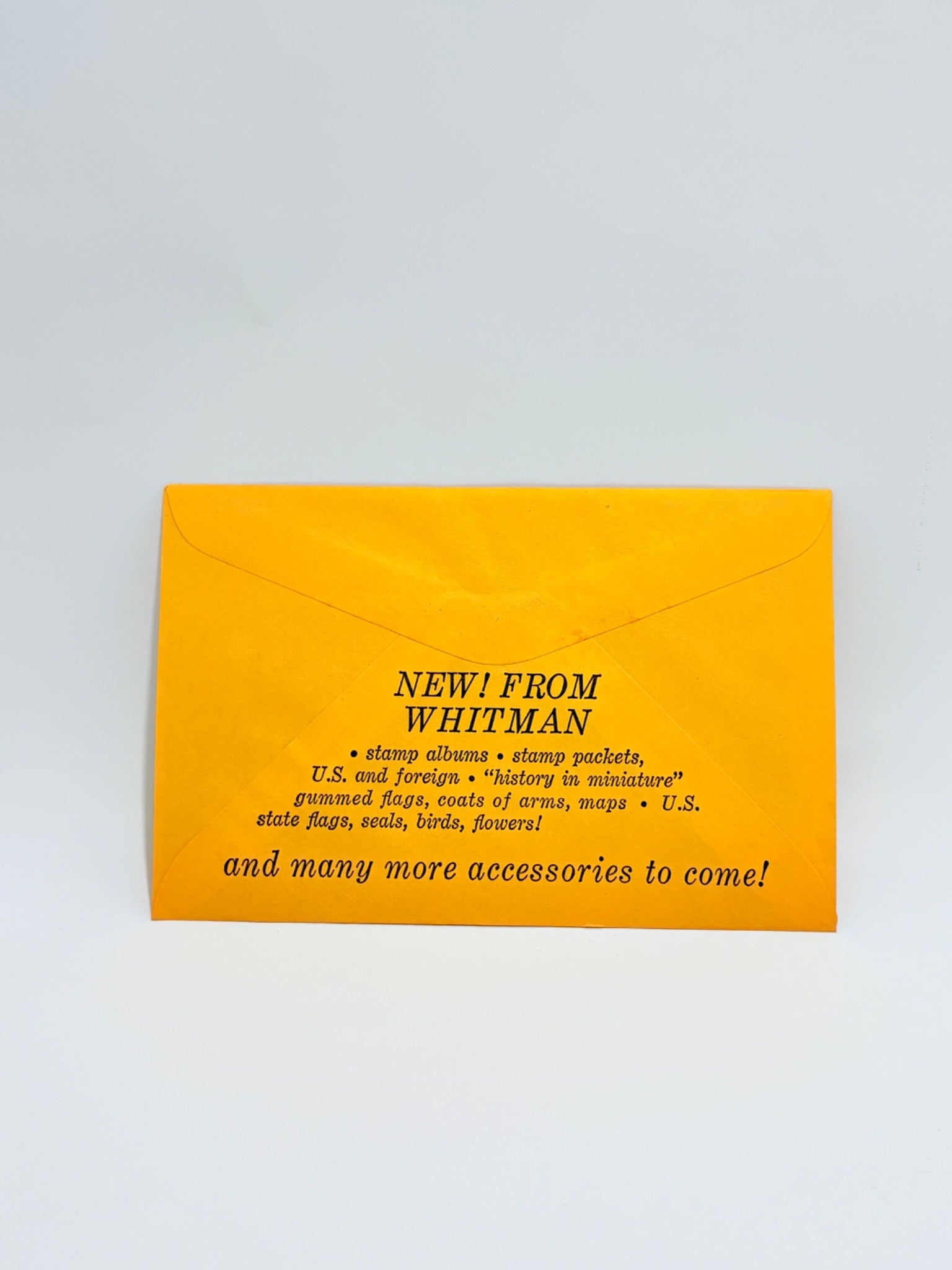 Yellow card with black text on a light gray background