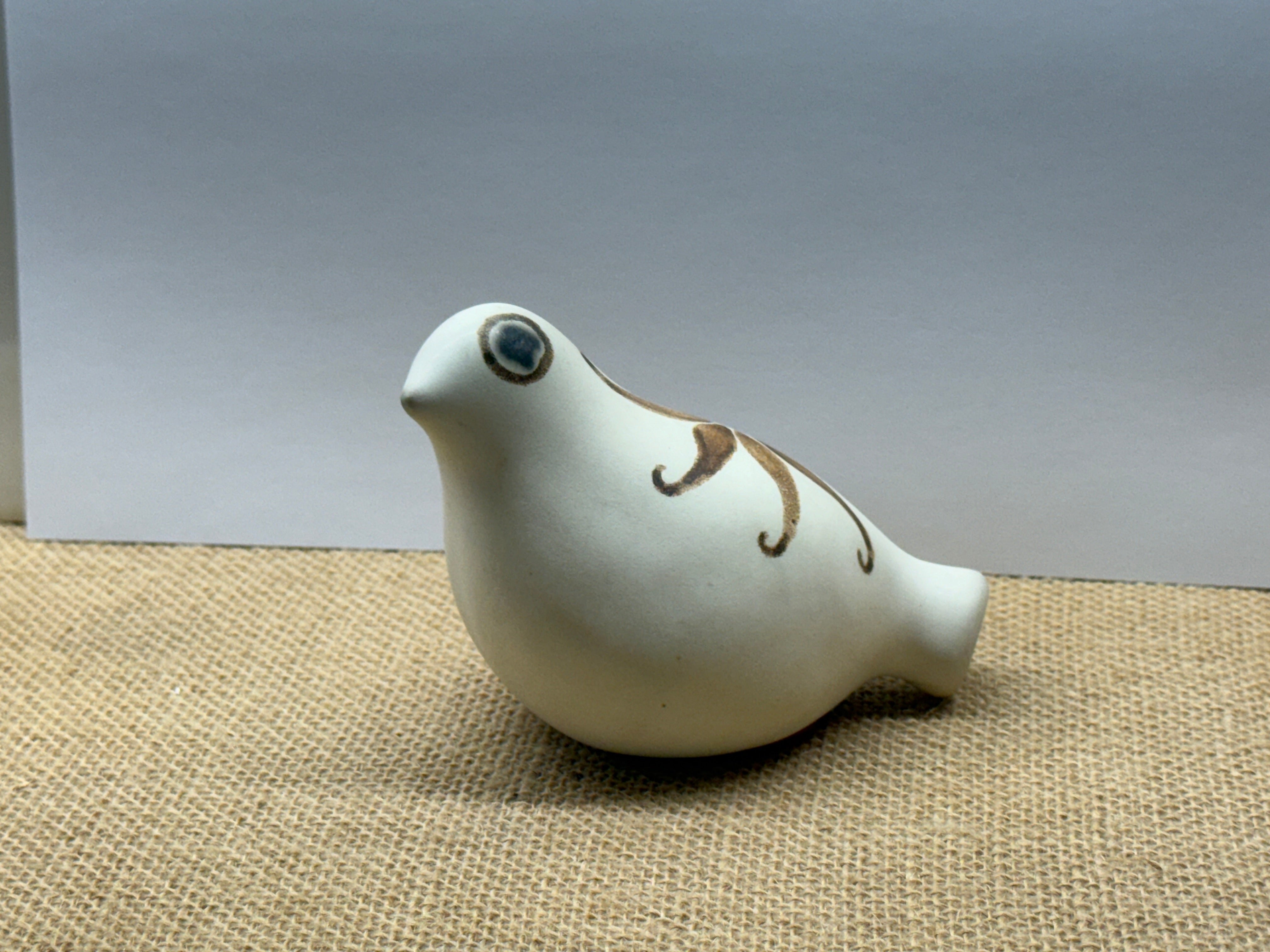 White Wings Tucked Medium Bird