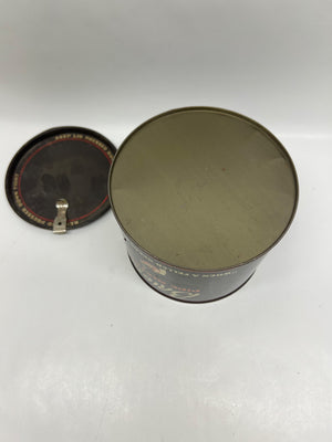 Round metal can with a lid on a white background