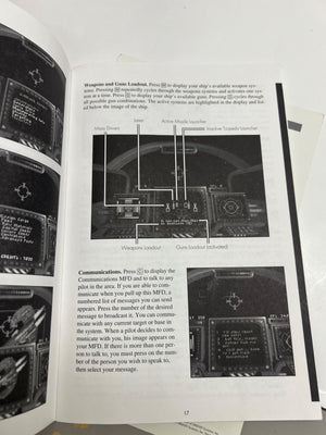 Open book with technical diagrams and text on a dark background