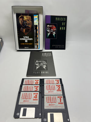 Collection of Amstrad CPC computer software and accessories on a white background