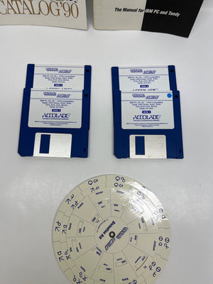 Two floppy disks with blue labels and a circular component on a white background.