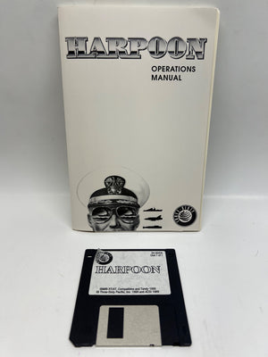 Harpoon operations manual with floppy disk on a white background