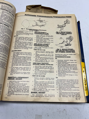 Open book with technical text and diagrams on a white background