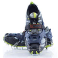 Hiking shoe with crampon on a white background