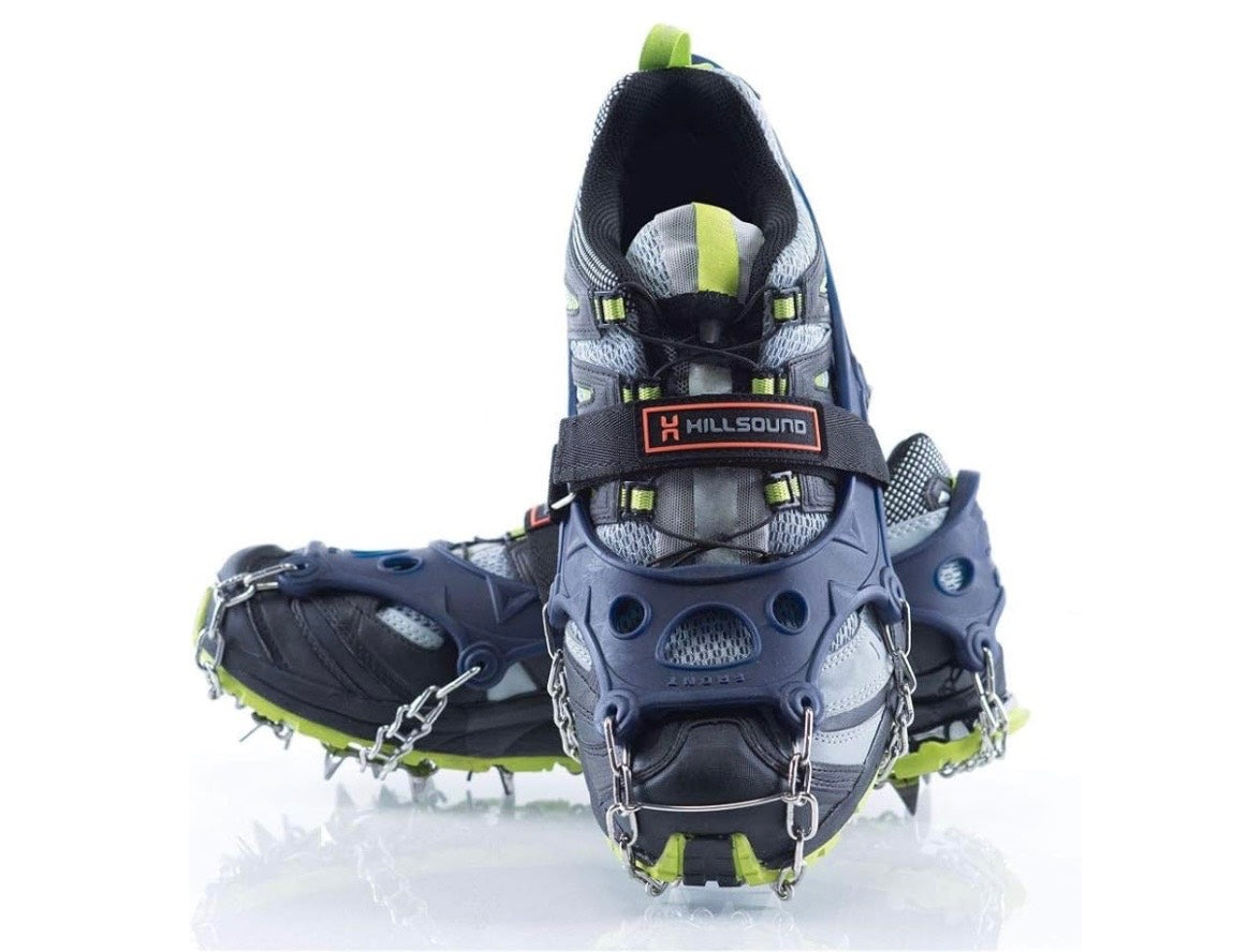 Hiking shoe with crampon on a white background