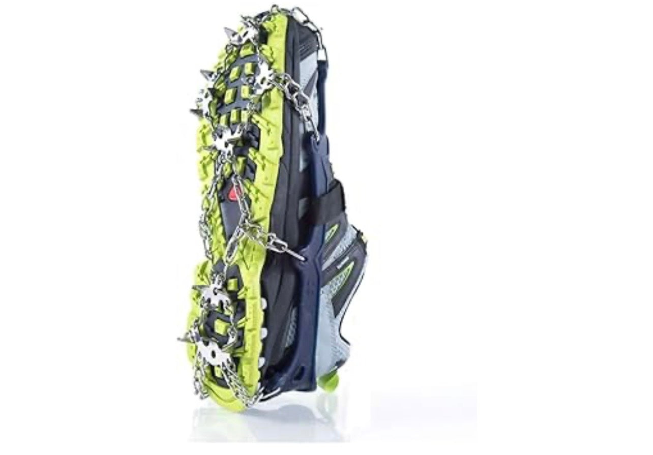 Pair of snowshoe crampons on a white background