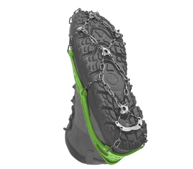 Snow shoe with metal chains on a white background