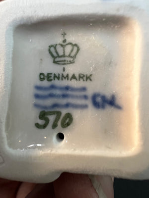 Ceramic product with 'Denmark' and number '570' branding on a white background
