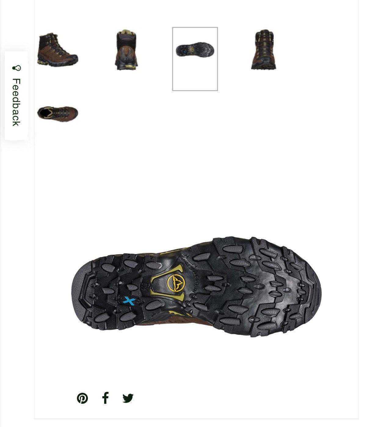 Close-up of a black hiking boot sole with brand logo on a white background