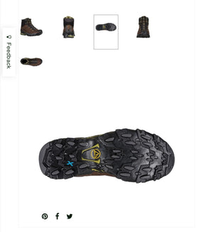 Close-up of a black hiking boot sole with brand logo on a white background