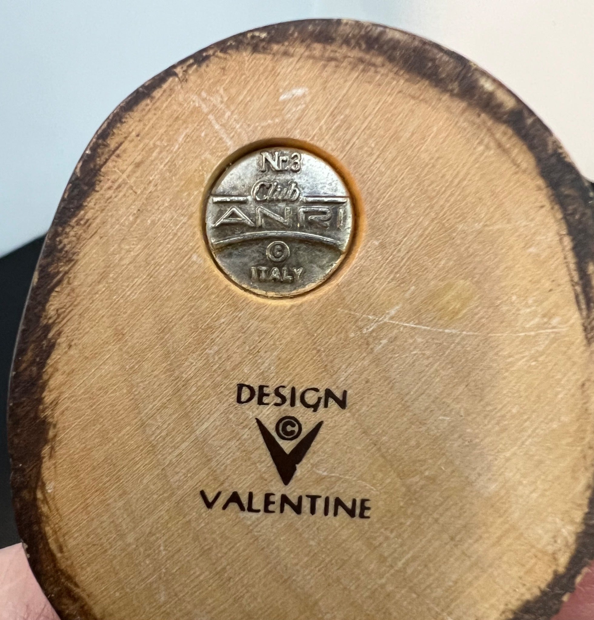 Wooden product with ANPI logo and 'Design Valentine' branding