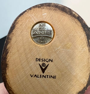 Wooden product with ANPI logo and 'Design Valentine' branding