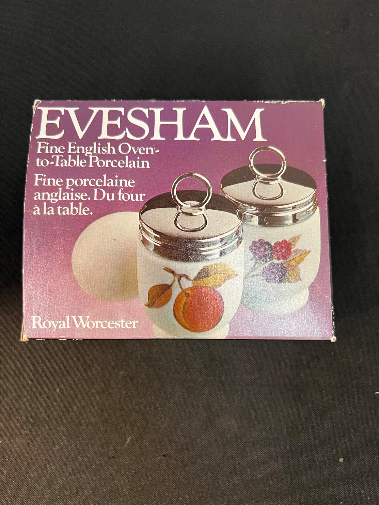 Evesham fine English porcelain canisters packaging with a black background
