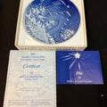 Bing & Grondahl plate with certificate and packaging on a dark surface