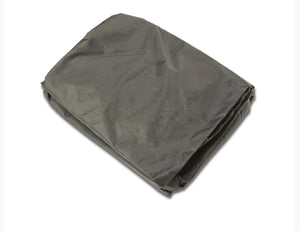 Folded gray tarp on a white background