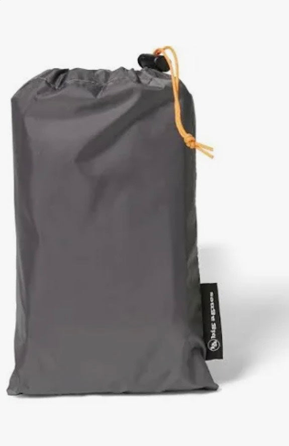 Gray drawstring bag with an orange drawstring on a white background