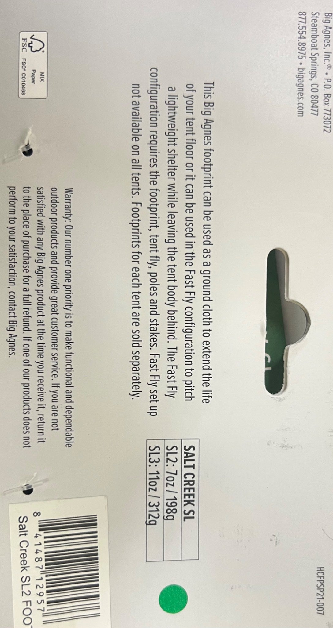 Back of a product packaging with text and a green label on a white background