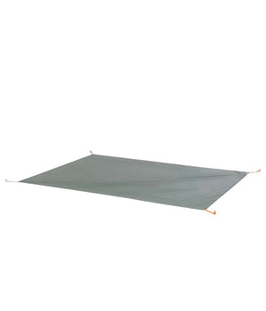 Green camping tarp on a white background