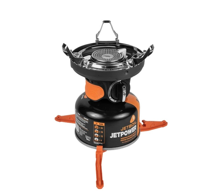 Jetboil stove with orange legs on a white background