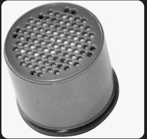 Gray metal shaker with perforated top on a white background