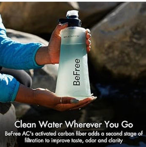 Person holding a Befree water bottle with text about clean water filtration.