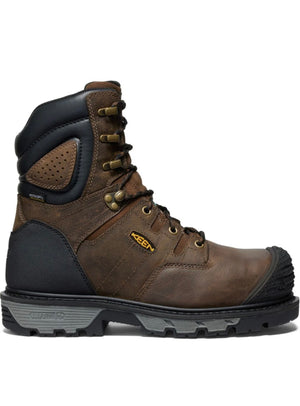 Brown work boot with black sole on a white background